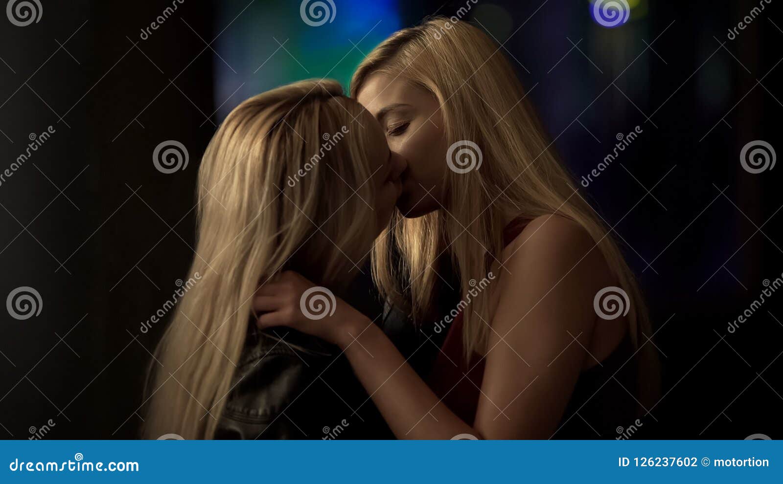 lesbians passionately kissing